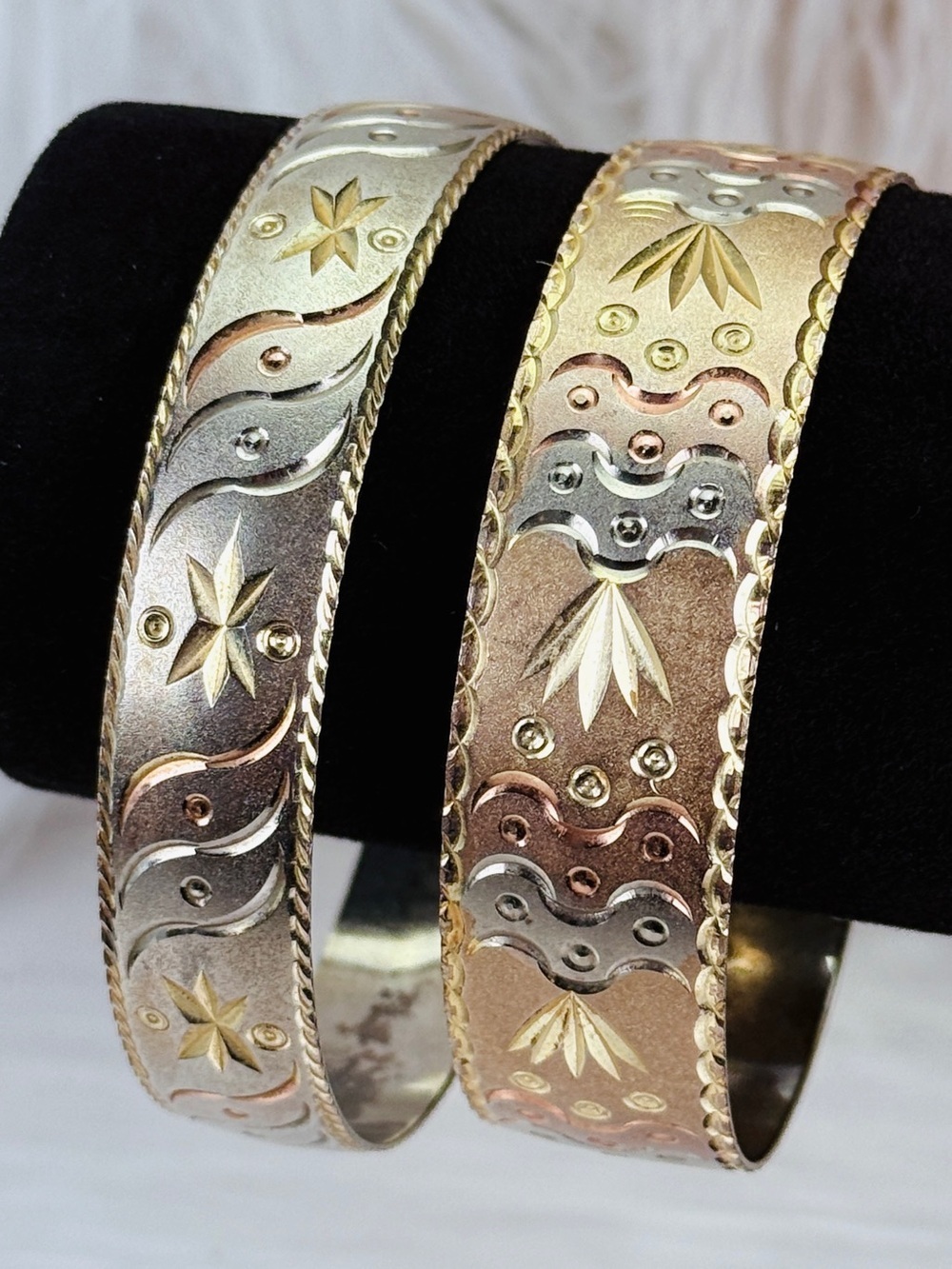 Vintage set of 2 aged silvertone goldtone etched,
 bangle bracelets